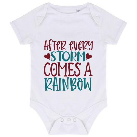 “AFTER EVERY STORM COMES A RAINBOW” BABY VEST BODYSUIT