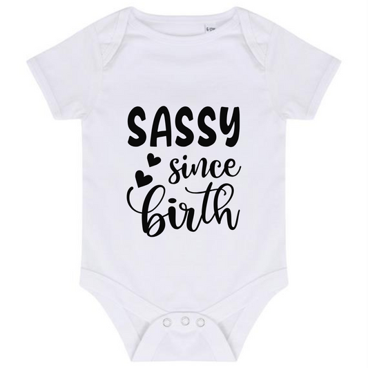 “SASSY SINCE BIRTH” BABY VEST BODYSUIT