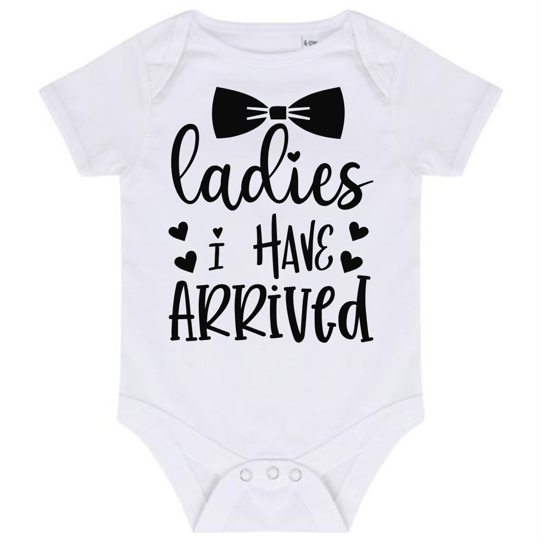 “LADIES I HAVE ARRIVED” BABY VEST BODYSUIT