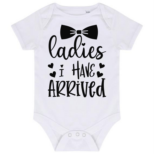 “LADIES I HAVE ARRIVED” BABY VEST BODYSUIT