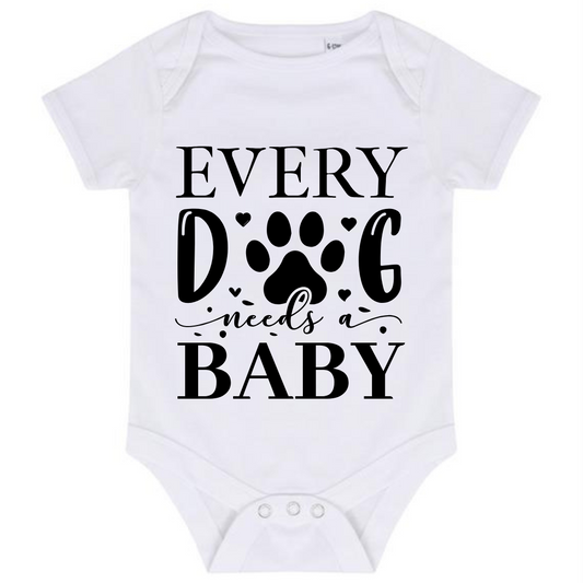 “EVERY DOG NEEDS A BABY” BABY VEST BODYSUIT