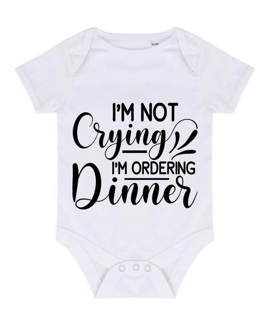 “I’M NOT CRYING I’M ORDERING DINNER” BABY VEST BODYSUIT