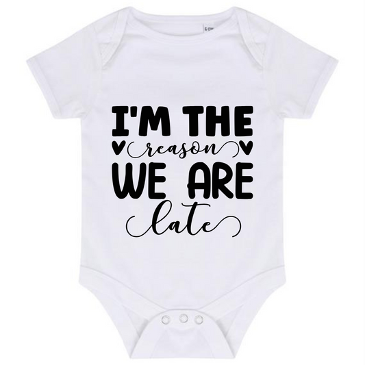 “I’M THE REASON WE ARE LATE” BABY VEST BODYSUIT