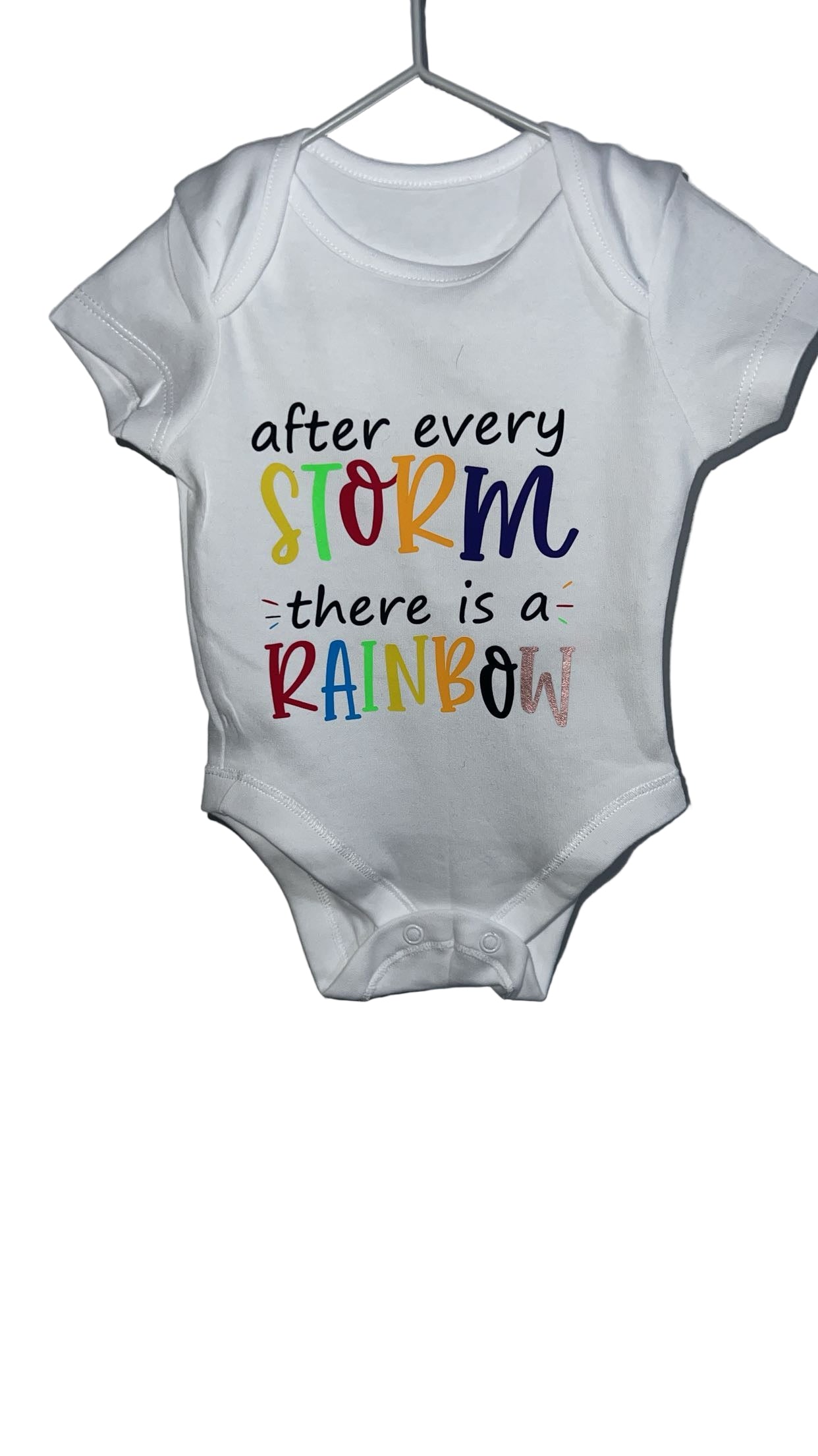 “AFTER EVERY STORM THERE IS A RAINBOW” BABY VEST BODYSUIT